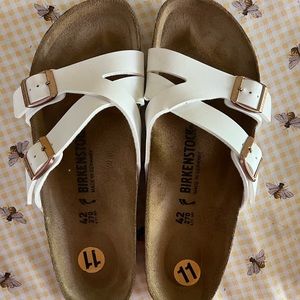 Slip on white Birkenstocks. Worn only 2x.
